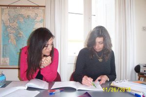My classmate Suzy, left, studying with our teacher Dora at the Athens Centre.