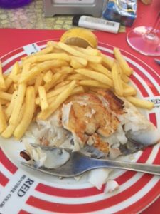 French fries were often served to us along the camino. Here with fish. 
